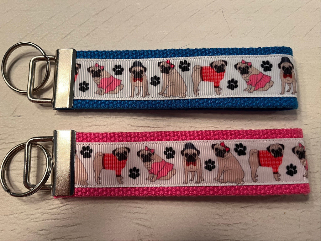 Pug Lover’s Wristlet Keychain – Dressed-Up Pug Design 🐾💙
